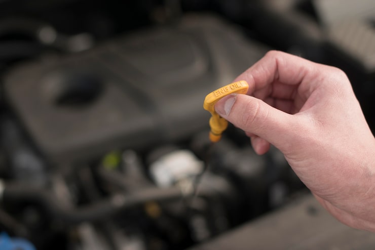 Draining dark old engine oil